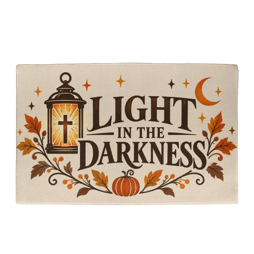 Light in the Darkness Christian Halloween welcome mat with a glowing cross lantern and crescent moon