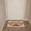 Pumpkins Prayer Praise doormat shown at a fall front entryway