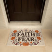 Faith Over Fear Christian fall welcome mat styled with autumn porch decor