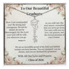 Graduation-themed necklace with inspirational message in a decorative box