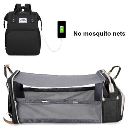 Black diaper backpack with fold-out changing station and USB charging port